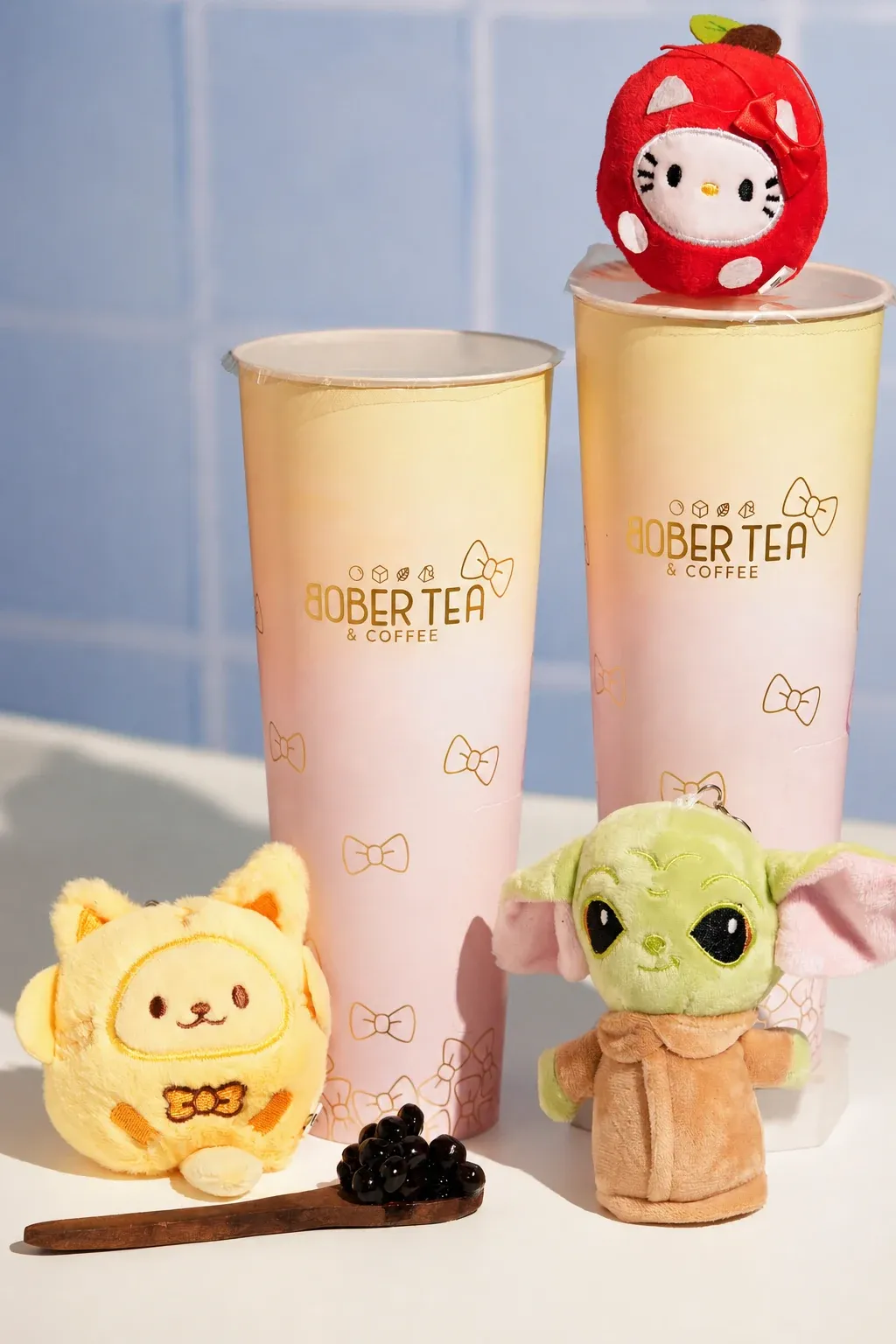 Two Bober Tea Surprise Cups displayed with collectible plush characters